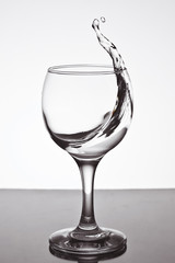 a glass of water on white background.