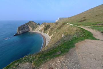 Fototapeta na wymiar Beach and cliff areas near Durdle door in Dorset. 