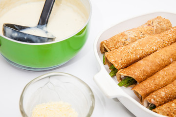 Quinoa crepes preparation :  Rolled and filled quinoa crepes