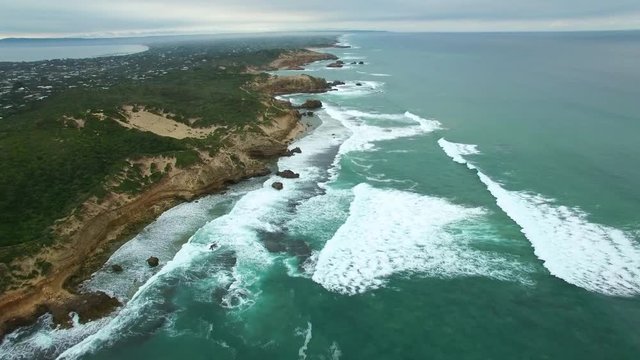 Forward flight along beautiful rugged coastline near Sorrento Ocean Beach. Mornington Peninsula, Victoria, Australia