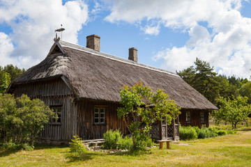 Fototapeta na wymiar Wooden rural house, Baltic traditions, Latvia