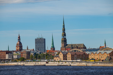 Fototapeta premium RIGA, LATVIA - 12 JUN 2016: Old town summer day view with Daugava river