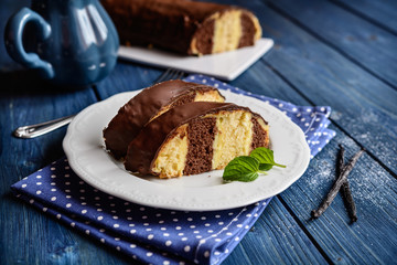 Traditional Meter Cake stuffed with vanilla cream and chocolate topping