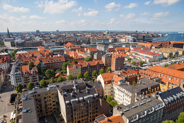 Fototapeta na wymiar Aerial view of Copenhagen red roofs and canal. Christianshavn and central distrinct