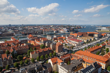 Fototapeta na wymiar Aerial view of Copenhagen red roofs and canal. Christianshavn and central district