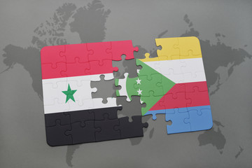 puzzle with the national flag of syria and comoros on a world map