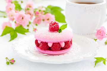 French makarons cake with raspberries.