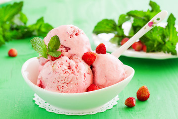 Homemade ice cream with wild strawberry.