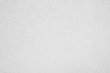 White rough grunge concrete grain wall texture.