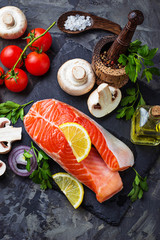 Salmon, mushrooms, tomatoes and parsley