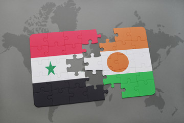puzzle with the national flag of syria and niger on a world map