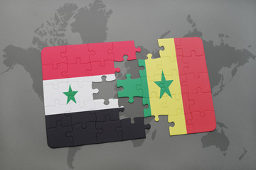 puzzle with the national flag of syria and senegal on a world map