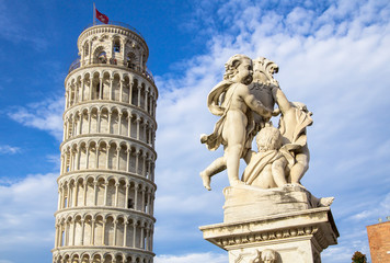 Fototapeta na wymiar Leaning Tower of Pisa and the Fontana dei Putti, Italy