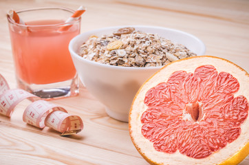 background of healthy food with muesli, juice and grapefruit/healthy food with muesli, juice and grapefruit