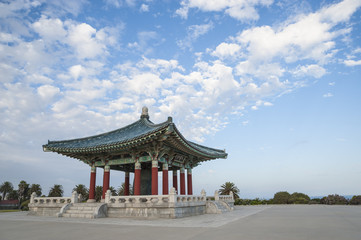Clouds on a blue sky over the Korean Friendship Bell in angel's gate park in San Pedro, California