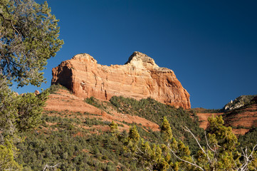 Fototapeta premium Butte at Oak Creek Canyon, Arizona on a sunny day with a blue sky