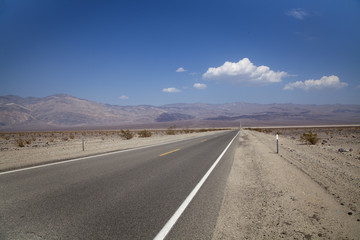 Fototapeta na wymiar A road running through Death Valley in California