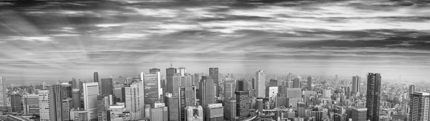 Amazing black and white panoramic sunset view of Osaka skyline, Japan, All ads removed