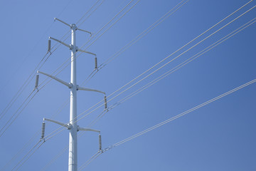 Utility Tower with Diagonal Wires Across Full Horizontal Frame