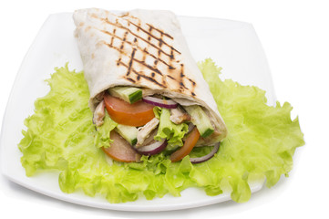 Shawarmas on lettuce isolated a white background
