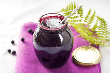 Bilberry confiture in a glass jar