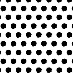 Seamless vector pattern with hand drawn small doodle dots.