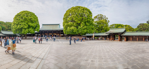 TOKYO - MAY 20, 2016: Tourists visit Meiji Shrine park. Tokyo is visited by 15 million people every year