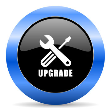 Upgrade black and blue web design round internet icon with shadow on white background.