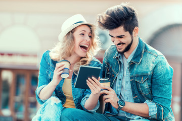 Happy young couple in the city