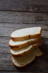 sliced ​​bread on wood background