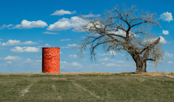 Smiling Silo / A old abandoned silo somebody drew a Smiley face on out on the Pawnee Grasslands