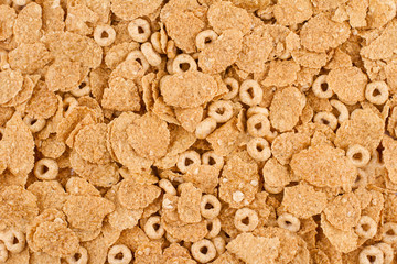 background of brown oat cereals top view