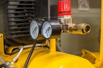 Close up of colorful manometers on machinery