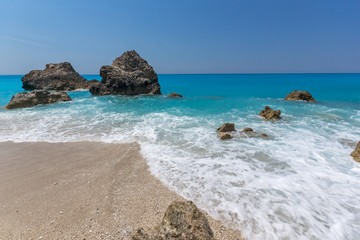 Amazing landskape of blue waters of Megali Petra Beach, Lefkada, Ionian Islands, Greece