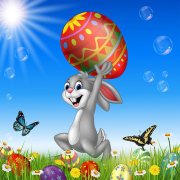 Cartoon rabbit carrying Easter egg