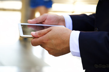 Man is holding tablet