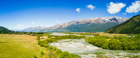 Fototapeta na wymiar Aerial view of Mountains over remote river, Glenorchy, Central Otago, New Zealand
