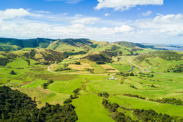 Fototapeta na wymiar 00:00 | 00:26 1×Aerial view of Green hills and valleys of the South Island, New Zealand