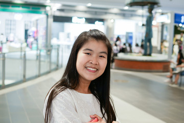 Beautiful young asian woman smiling 