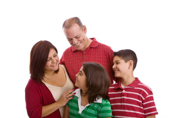 Fototapeta premium Happy family portrait smiling together - isolated on white background.