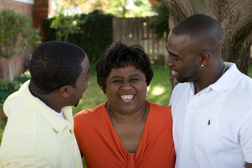 African American mother and her adult sons.