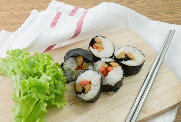 Veggie Sushi Rolls or Vegetable Maki on Wooden Board