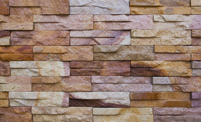 Colorful sandstone bricks wall background