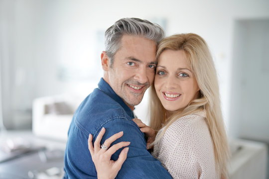 Portrait of loving middle-aged couple