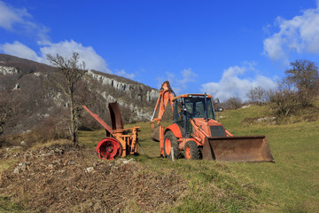 agricultural machinery in mountain scenary