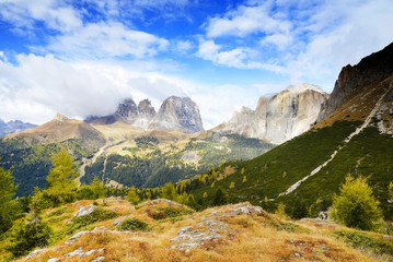 The Langkofel Group (in italian: Gruppo del Sassolungo) the massif mountain in the (western) Dolomites. View from Pass Pordoi. Italy, Europe. - obrazy, fototapety, plakaty