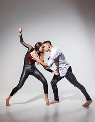 Two people dancing in contemporary stile