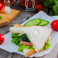 Fototapeta na wymiar Sandwich with fish and cucumber