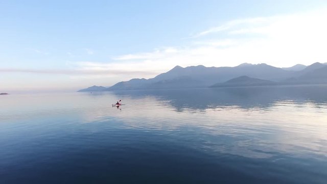 Kayak on Lake Skadar in Montenegro. Tourist kayaking. Aerial Photo drone.