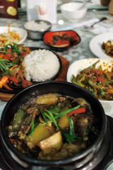 bibimbap in a heated stone bowl, korean dish